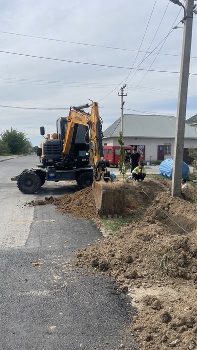 Эксковатор Колесный ,Малютка 55,60