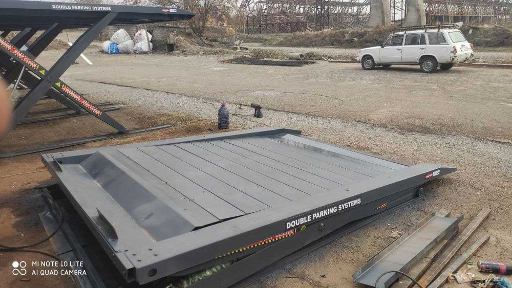 «Два авто на одном месте: Двухуровневая парковка от производителя»