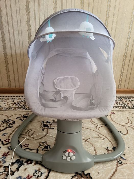 Электрический детский шезлонг