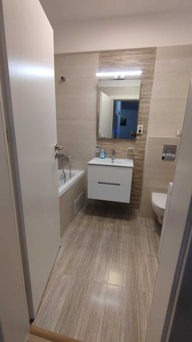 Inchiriez apartament 2 camere, utilat, 1 loc parcare