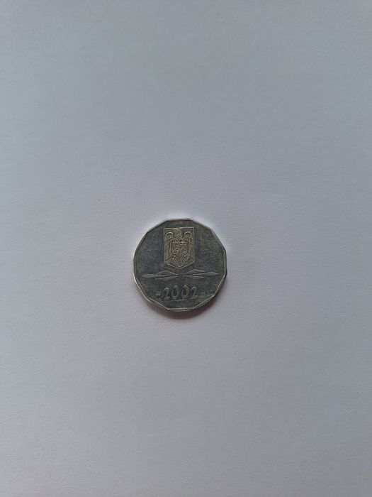 Vând monedă rară cu formă dodecagonală (12 laturi)