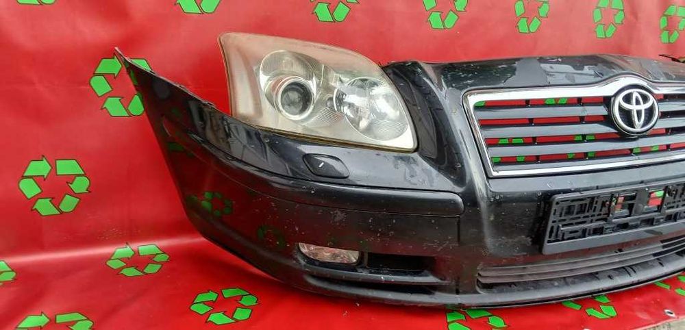 Bara fata completa cu faruri Toyota Avensis 2003 2004 2005 2006 cod 2119-05160 76852-05010