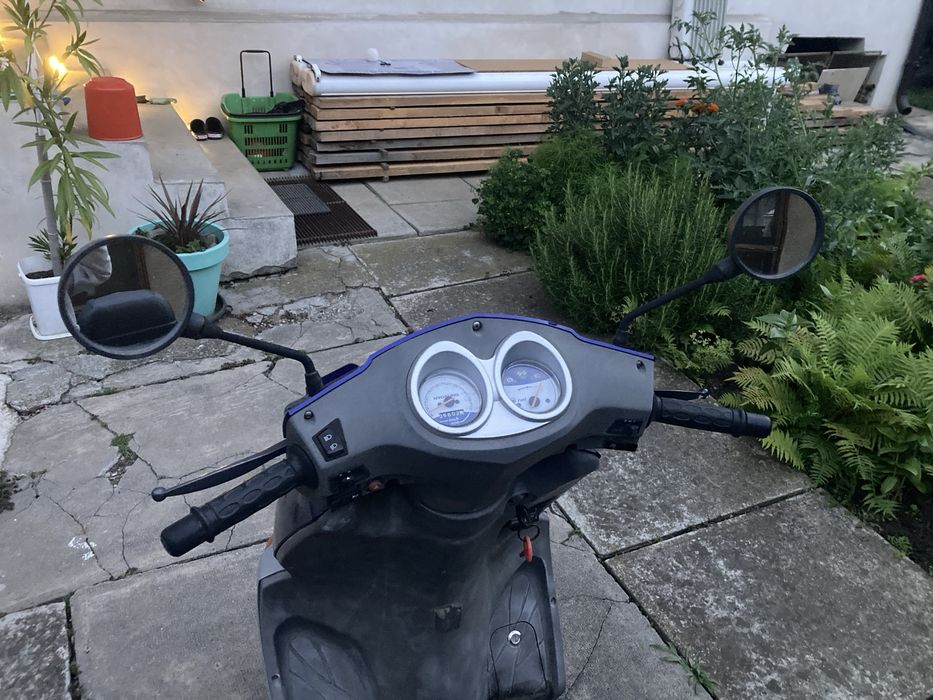Scuter  125 cmc Hyosung Boomer