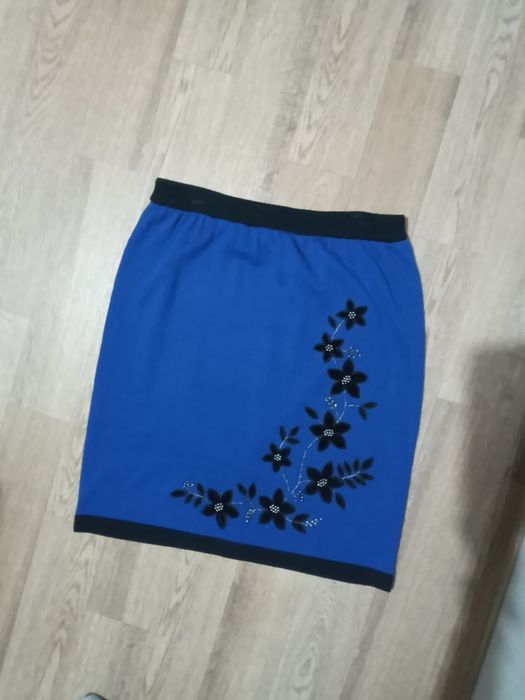 Женская одежда .