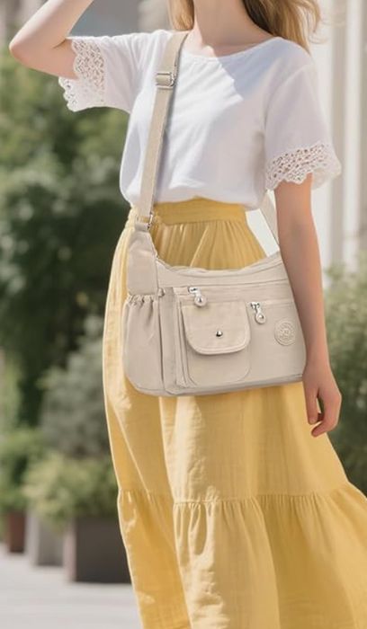 Geantă crossbody impermeabilă, spațioasă, cu multe buzunare Mindesa