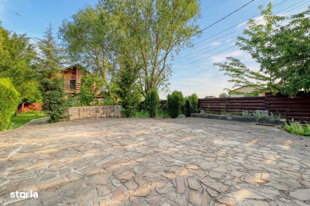 Vila individuala cu 589 mp teren, foisor si gradina superba | Darza