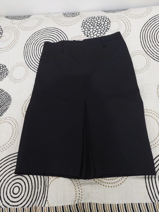 Отдам вещи две юбки две кофты на 36 размер