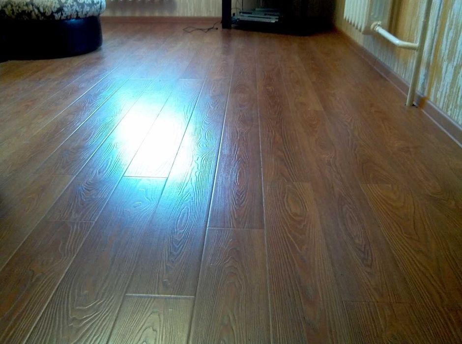 Укладка ламината Гарантия качества
