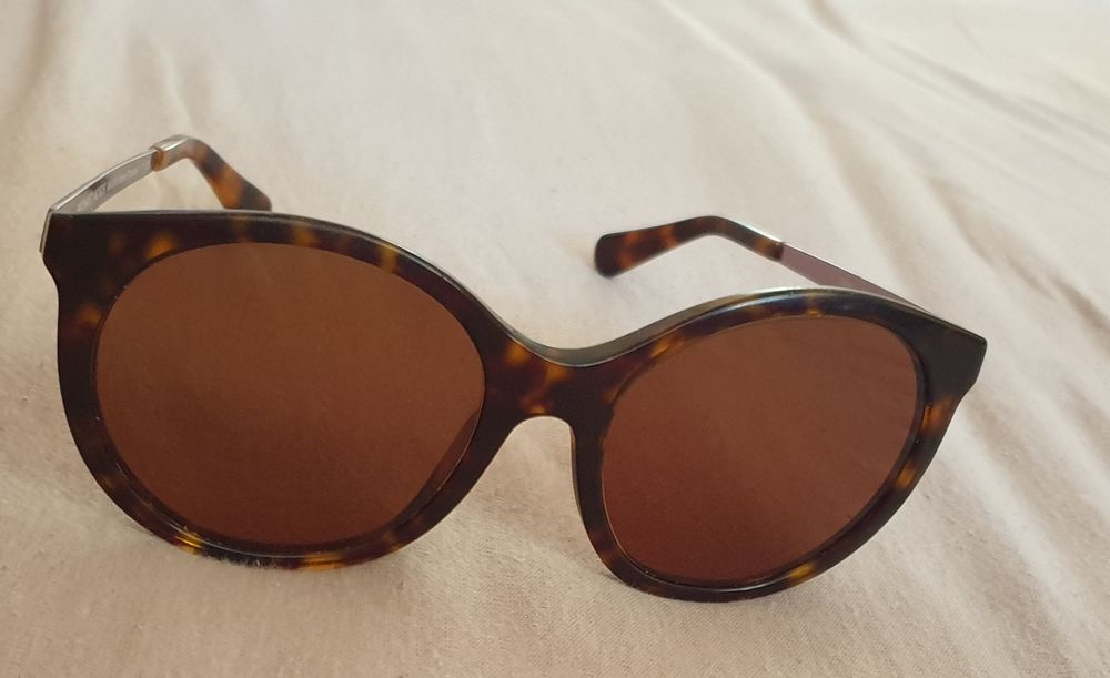 Vand ochelari Michael Kors și Police