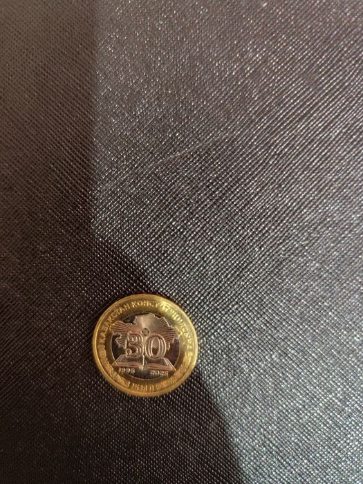 Продам монету 100тг