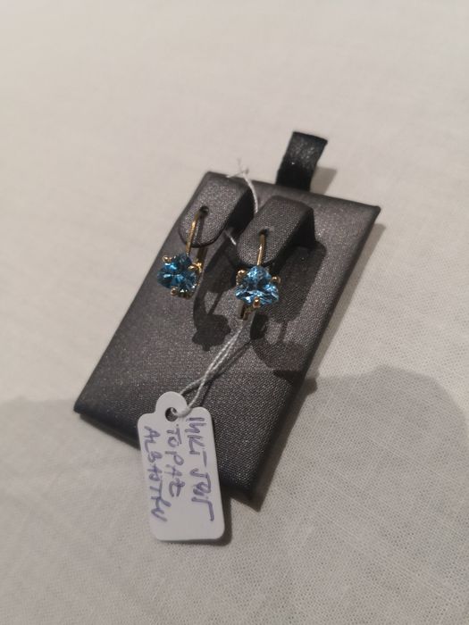 Vind cercei cu topaz