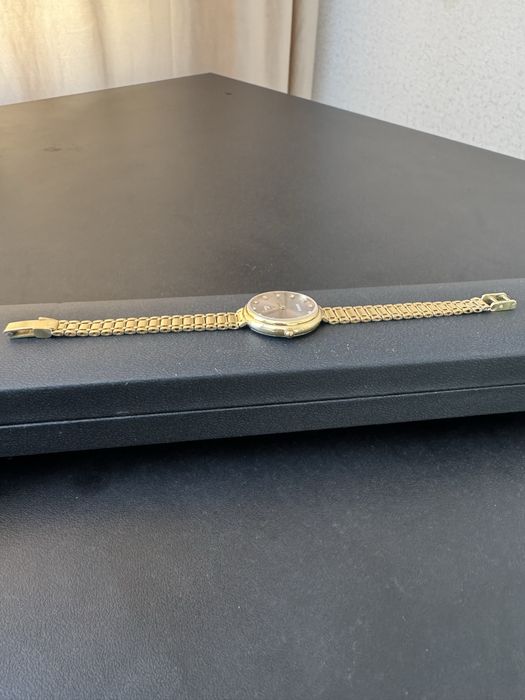 Часы золотые 750