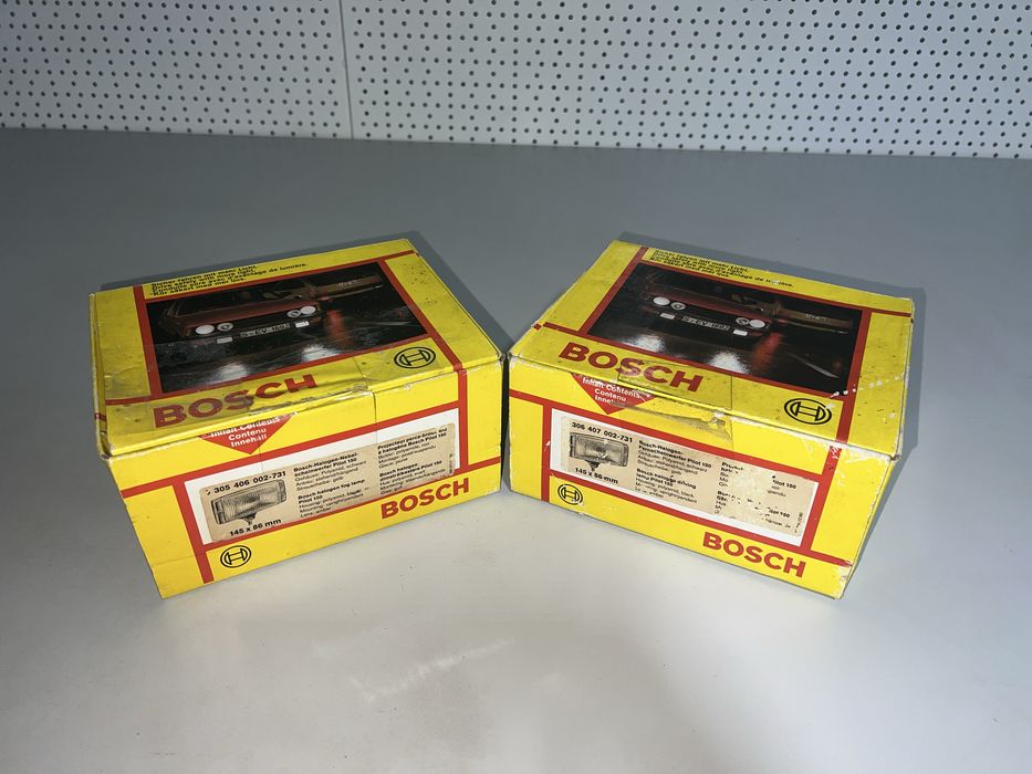 Vand doua proiectoare galbene vintage Bosch