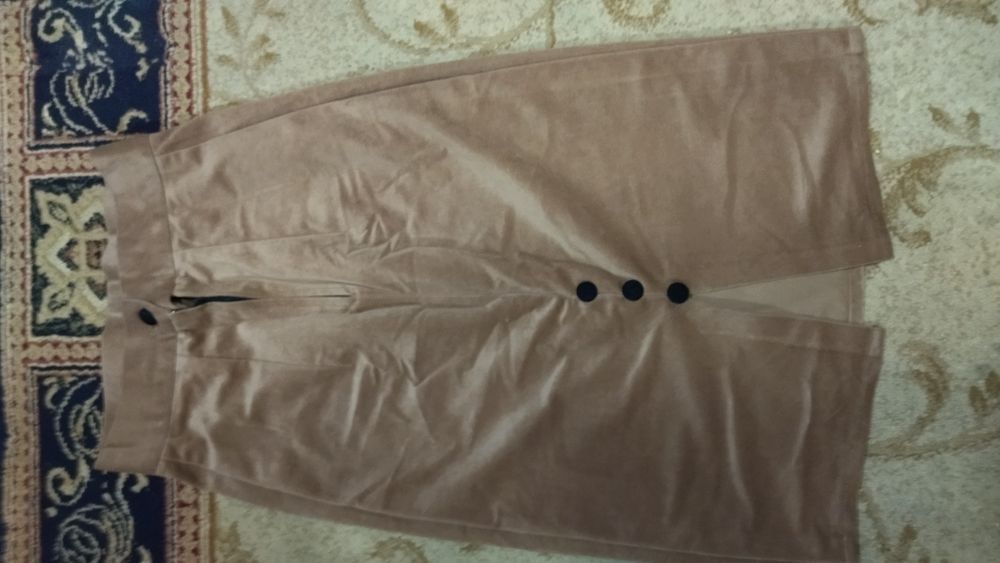 Юбка,красивая.Светло-коричневого цвета.