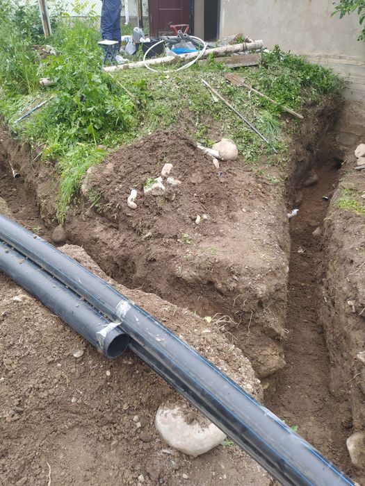 Копаем траншей  земляные работы