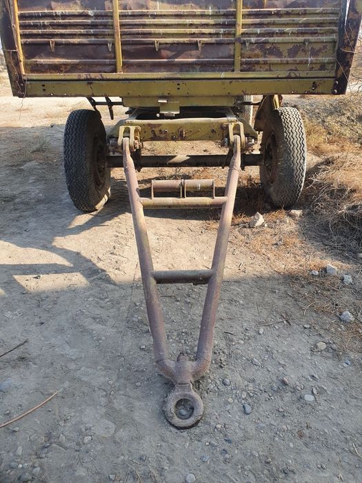 Маз прицеп яхши холатда бортлари хам бор балонлари ковчук