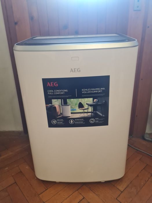 Мобилен климатик и обезвлажнител AEG, model AXP26U338CW, с гаранция