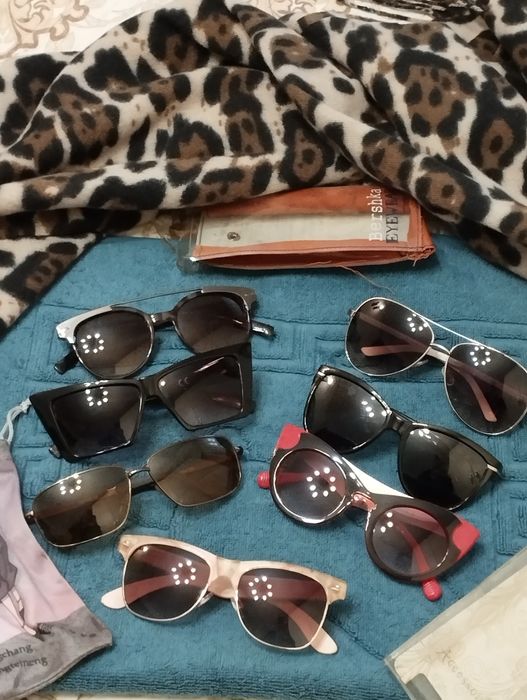 Солнцезащитные очки брендовые