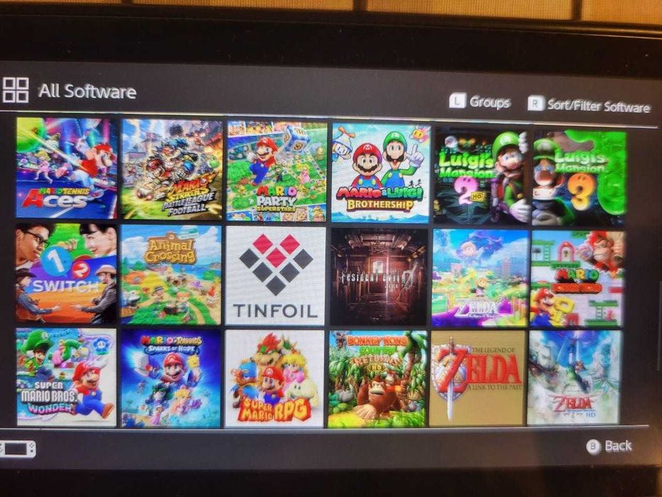 Nintendo Switch OLED modat full box card 512 GB cu 59 jocuri