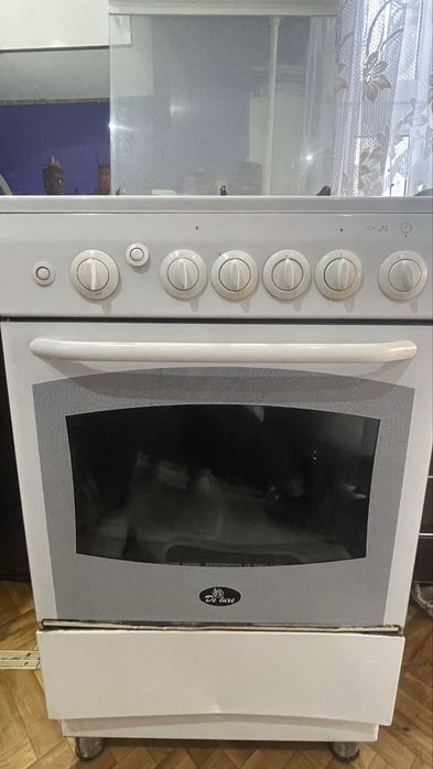 Газ плита  в рабочем состоянии