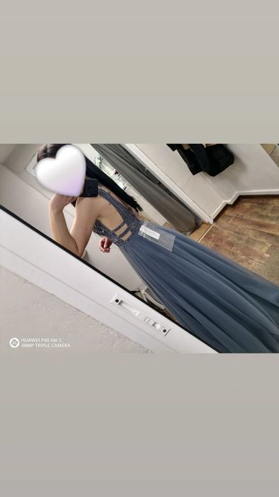 Официална рокля
Роклята е в перфектно състояние, без забележки.
 Цвят - Dusty Blue. 
Изпр