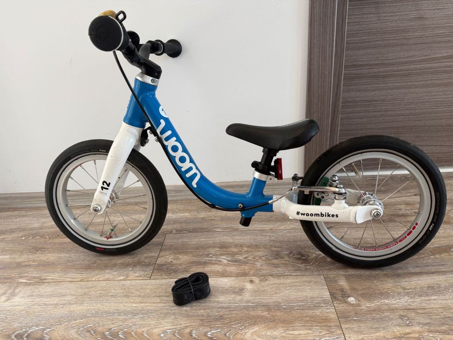 Bicicleta Woom 1 + geanta transport Butler, sonerie si camera