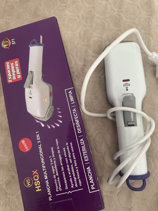 Паровой ручной утюг