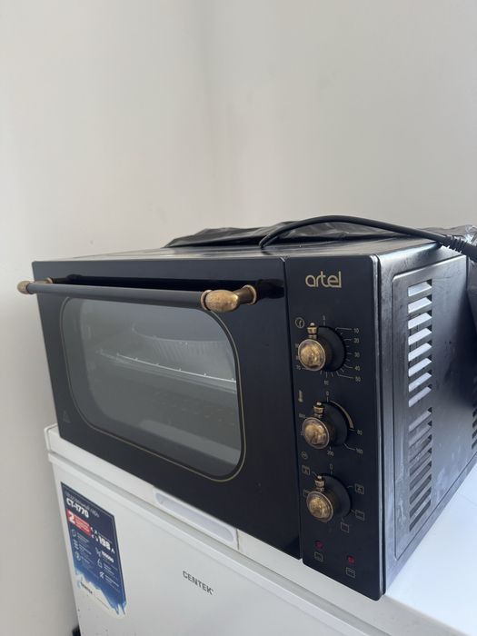 Мини- печь artel цвет черный.