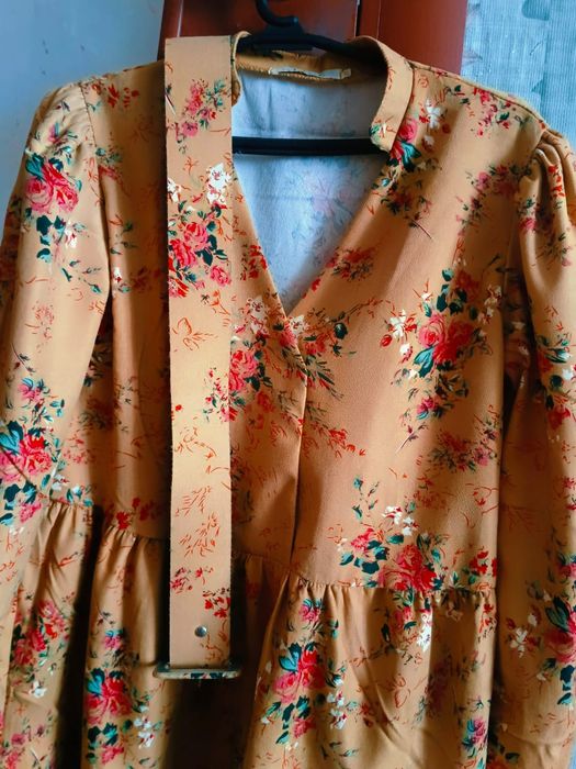 Платья средней длины