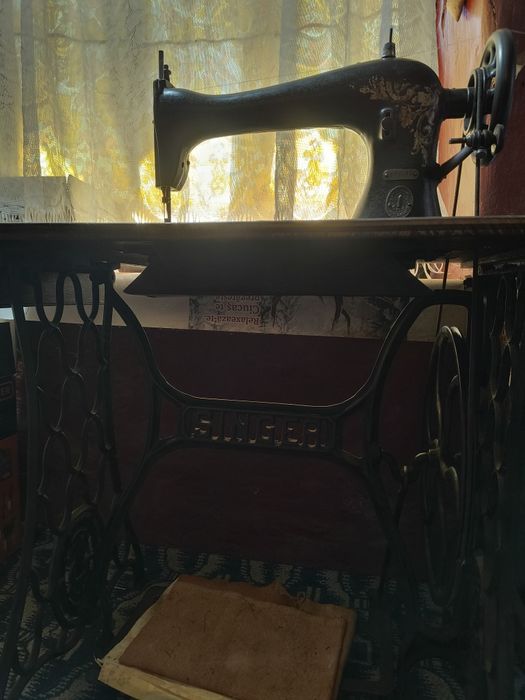 Mașină de cusut Singer