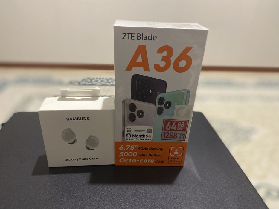 Продам телефон и наушник новый