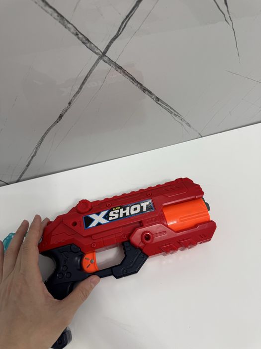 Игрушка пистолет