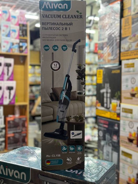 Вертикальный пылесос два в одном ручной.