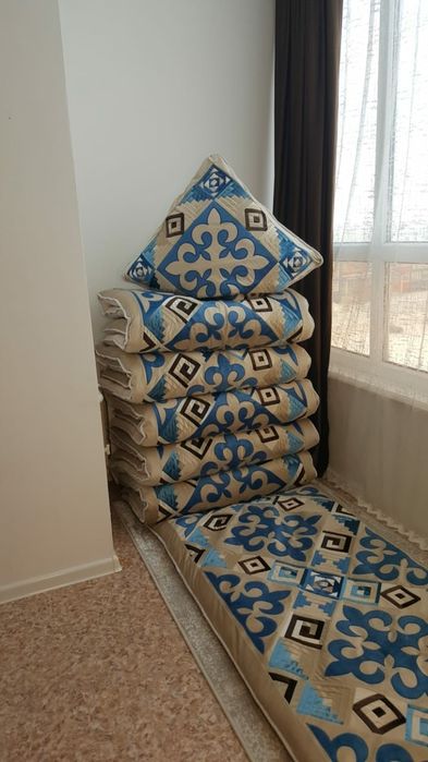 Құрақ көрпе ою-өрнекпен тігілген