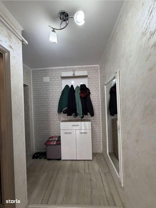 Apartament cu 2 camere,terasa,parcare inclusa,etaj intermediar