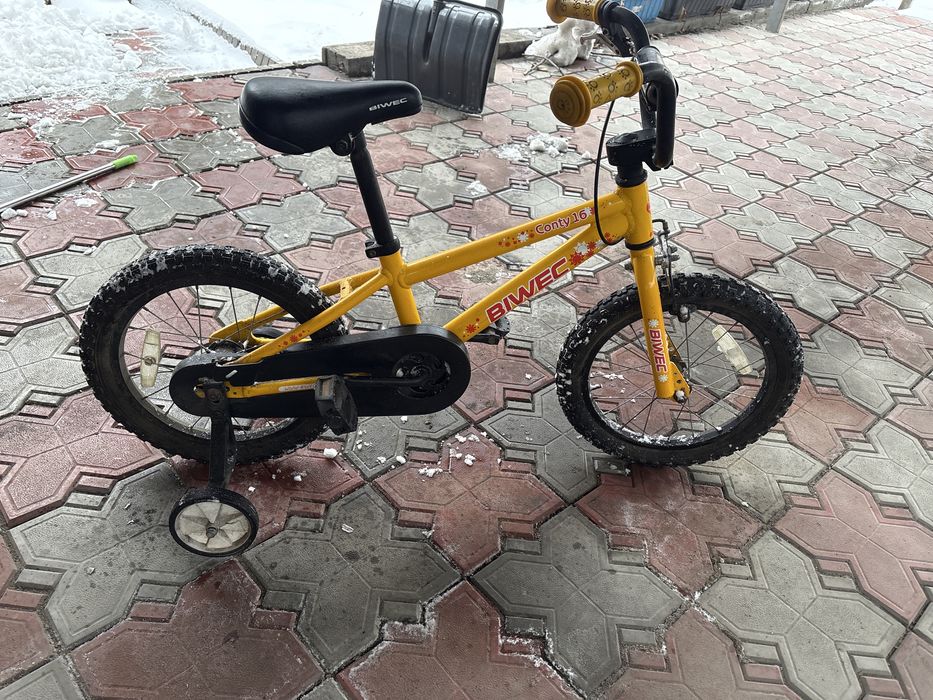 Четырехколесный велосипед