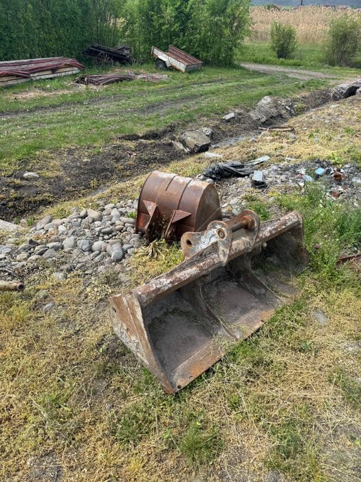 Buldoexcavator fai komatsu