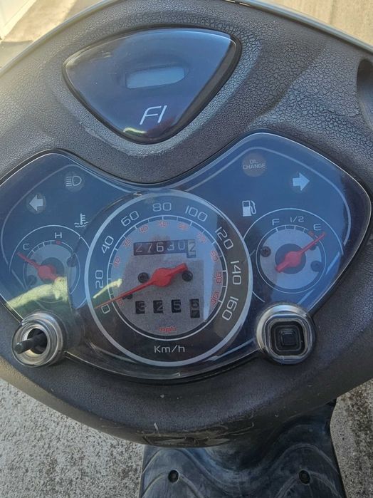 Скутер  Хонда 125i