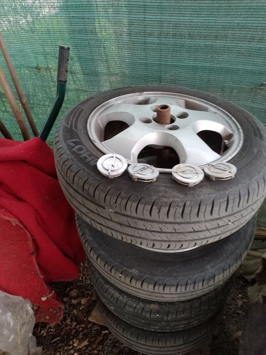 Jante Opel   R14 cu cauciucuri de vară