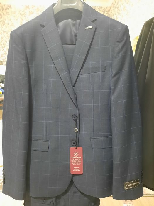 Продам костюм новый