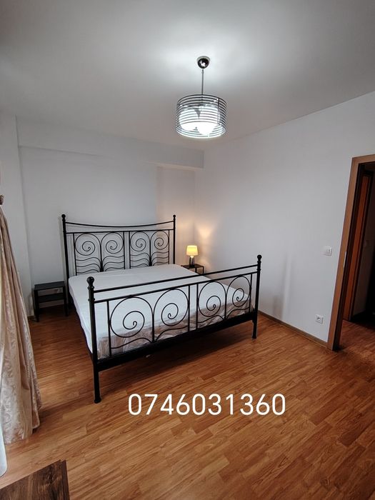 Închiriez apartament cu 2 camere + loc de parcare