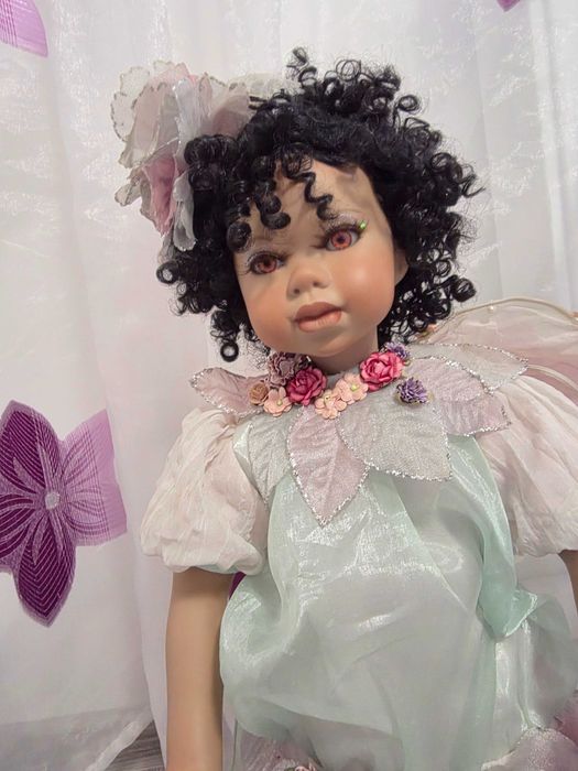 Păpușă de porțelan