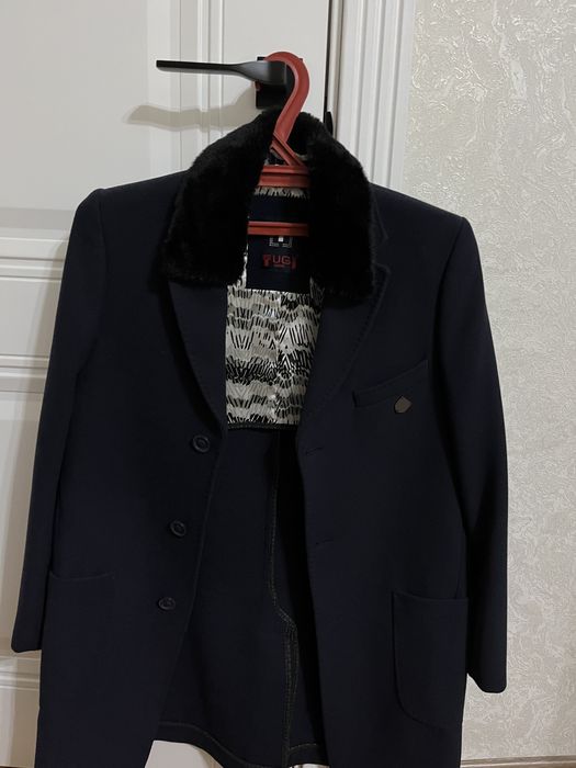 Пальто совсем новый