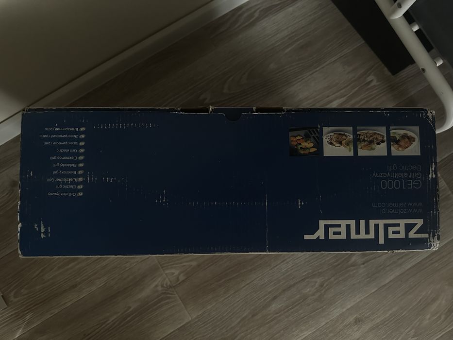 Продам электрический гриль ZELMER новый