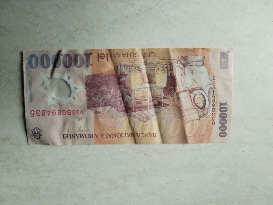 Bancnotă de 100000 seria B și bancnote 20