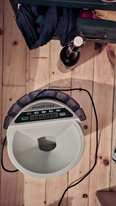 Монетоброячна машина - машина за броене на левове и стотинки