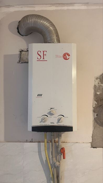 Газовая колонка марка SF бу.