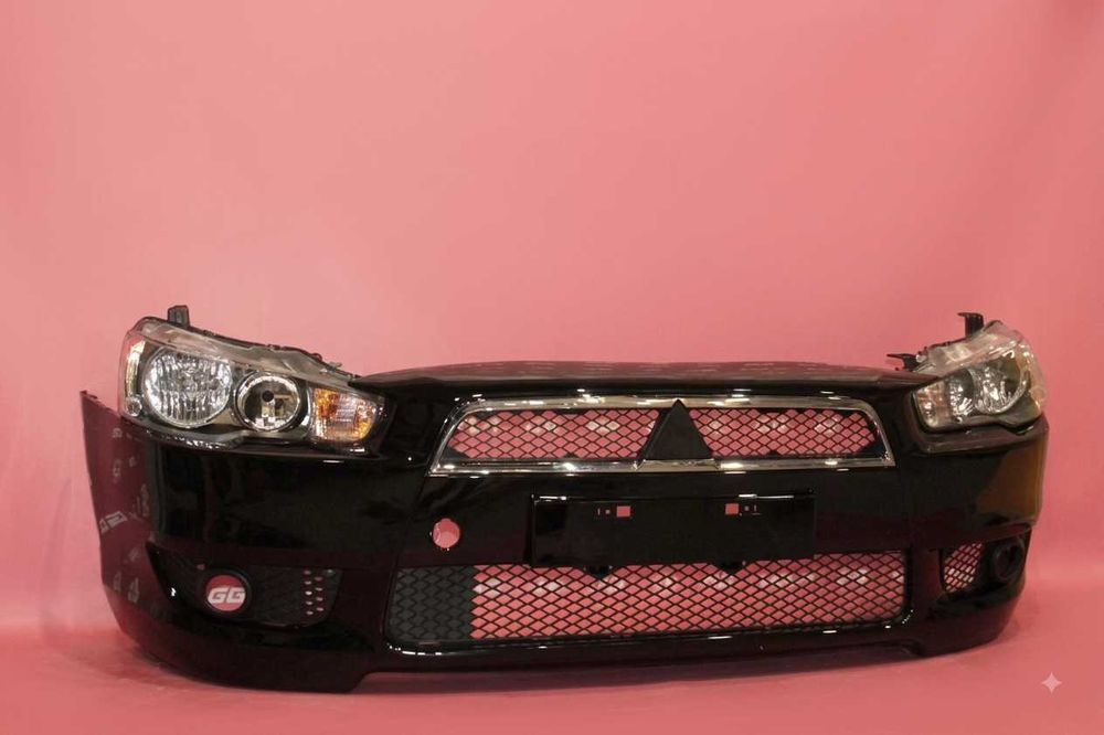 Бампер передний Mitsubishi Lancer