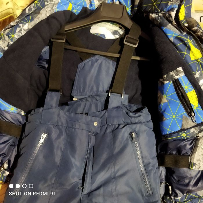 Продам зимний комбинезон на мальчика 122