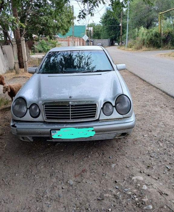 Мерседес  бенс 200е